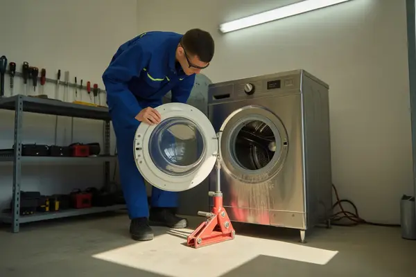 washing machine repair in progress